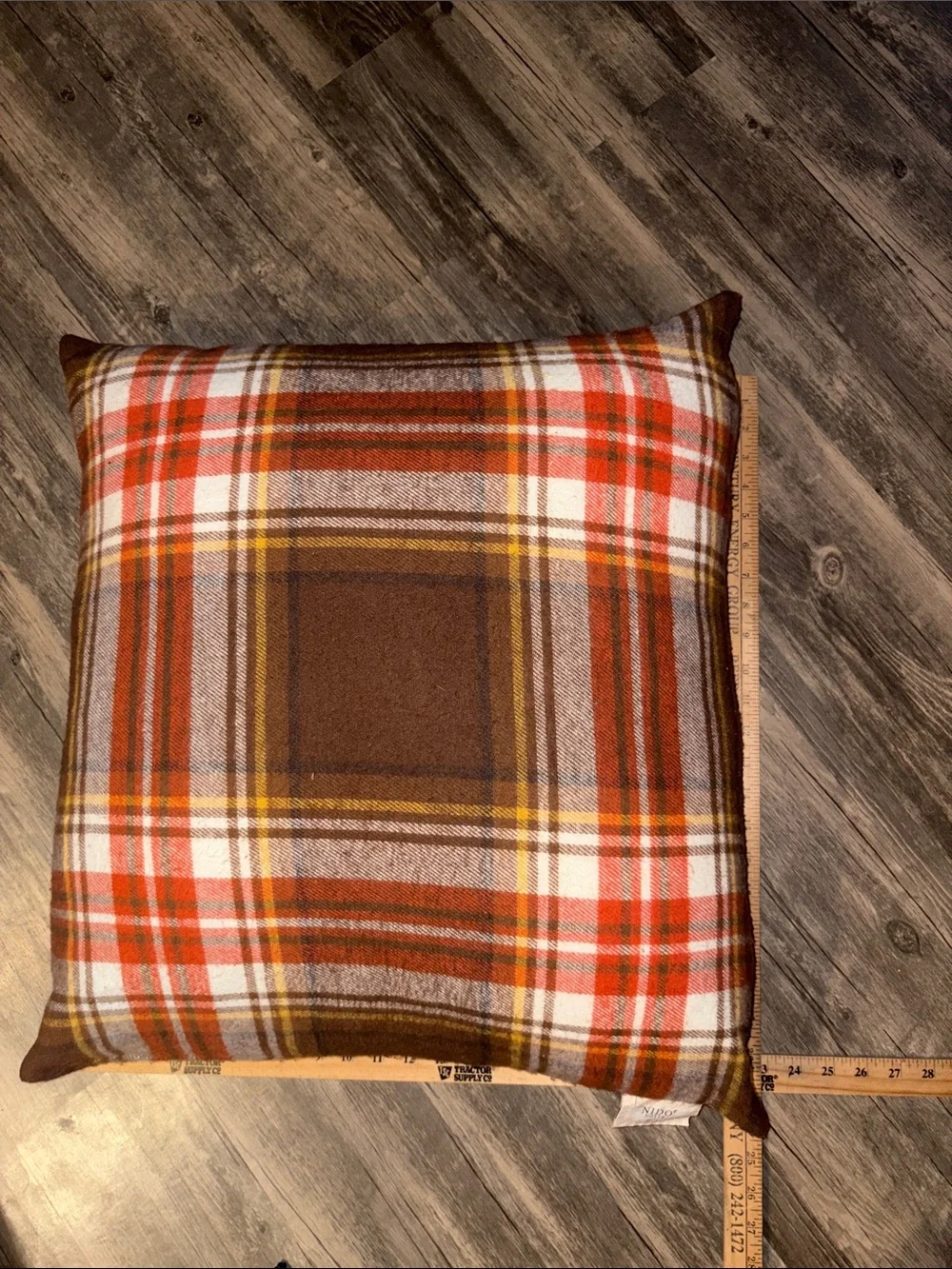 Nido plaid throw